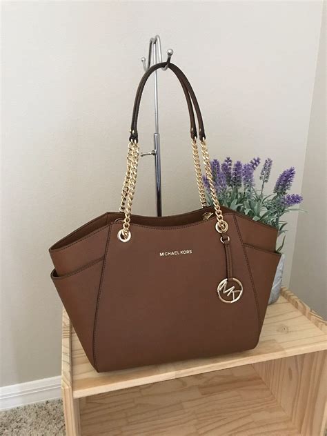 michael kors jet set large shoulder tote black gold|michael kors jet set brown.